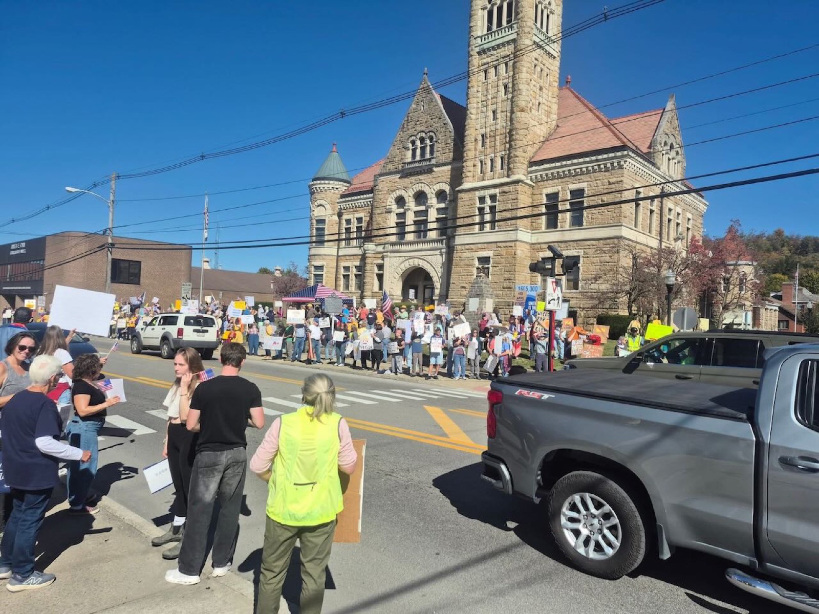 A long line of demonstrators across from the courthouse