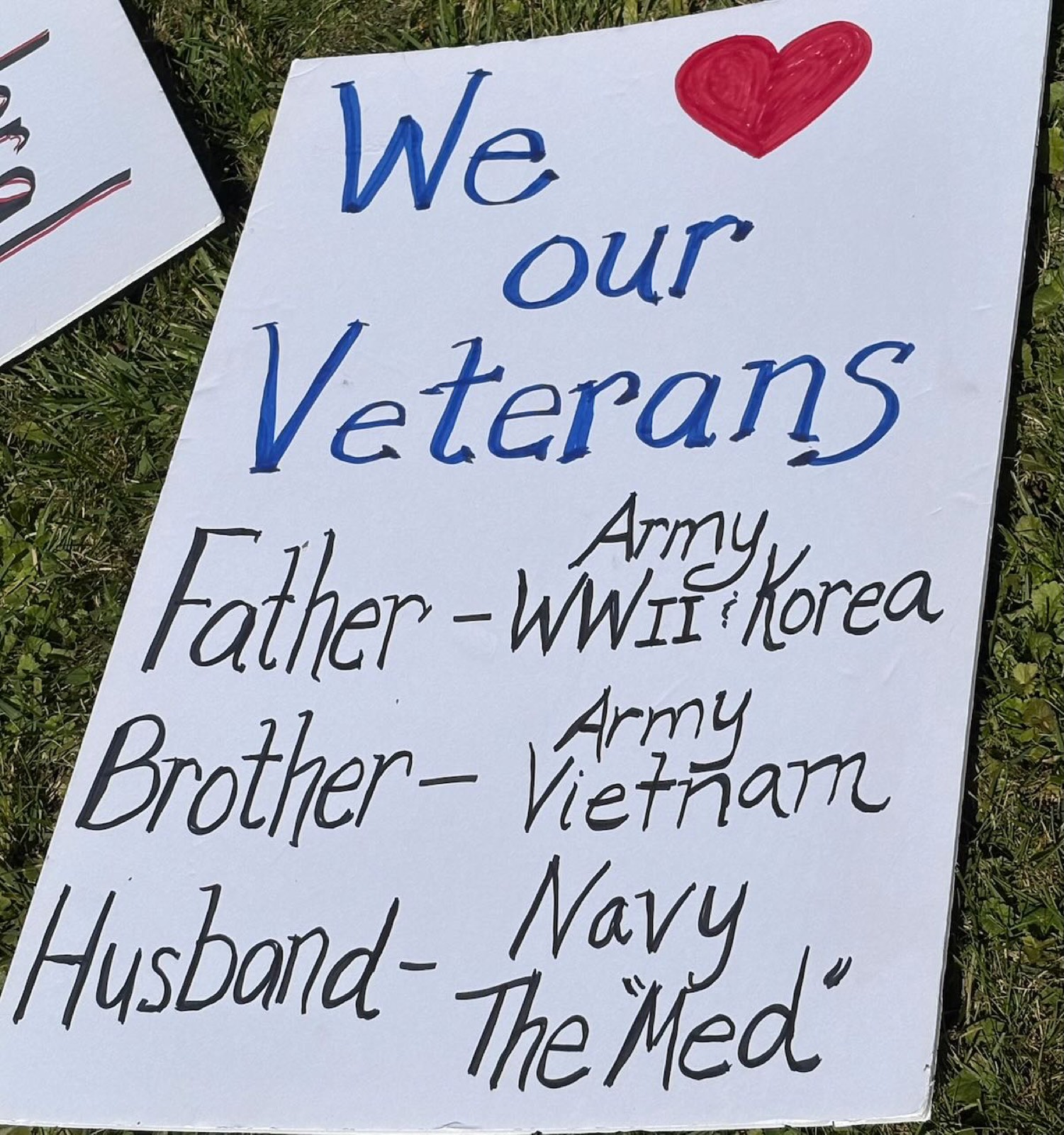 A sign honoring family members who served in the armed forces