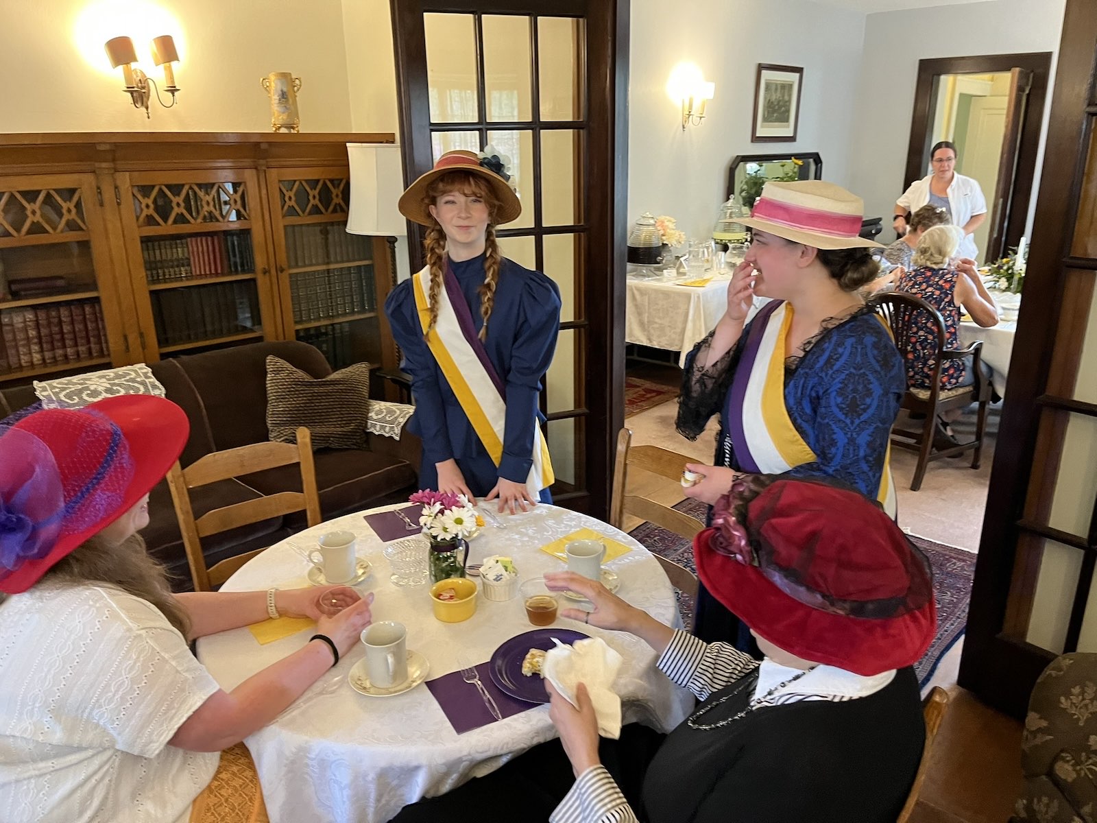 Club members dressed in period attire for the Suffragist Tea